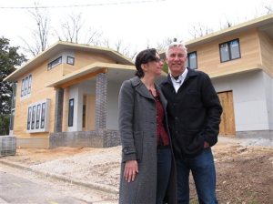 Marsha Gordon and Louis Cherry in front of their new home. AP Photo